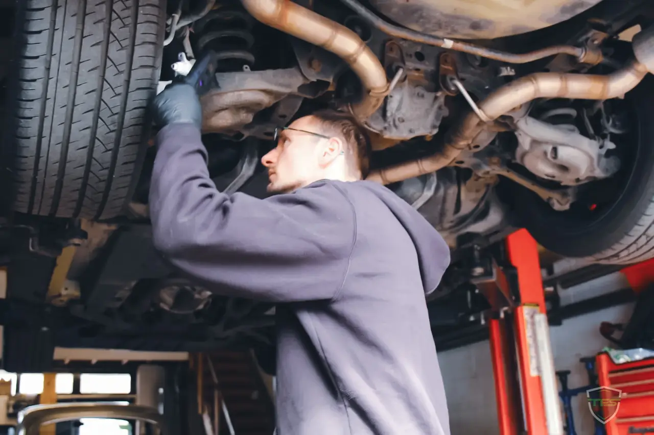 Mechanic working on a car